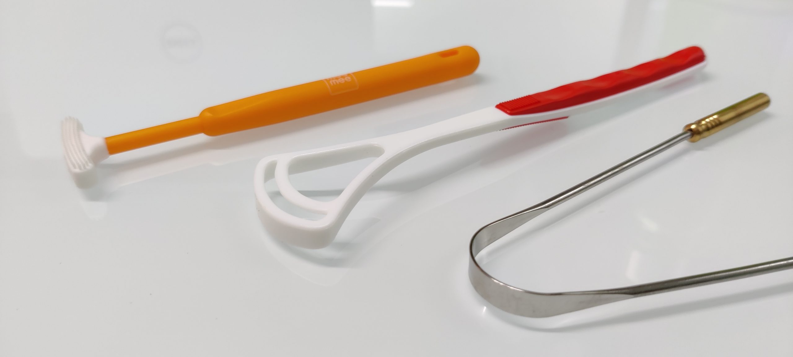 Choose the type of tongue scraper you want